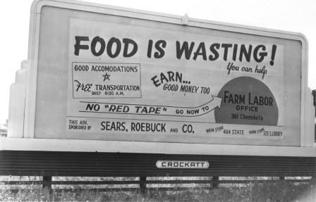 An outdoor sign by the Marion County farm labor office prior to the 1945 bean harvest.